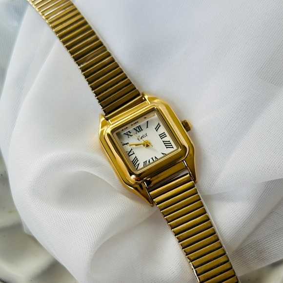 Gold Rectangular Watch with Roman Numerals